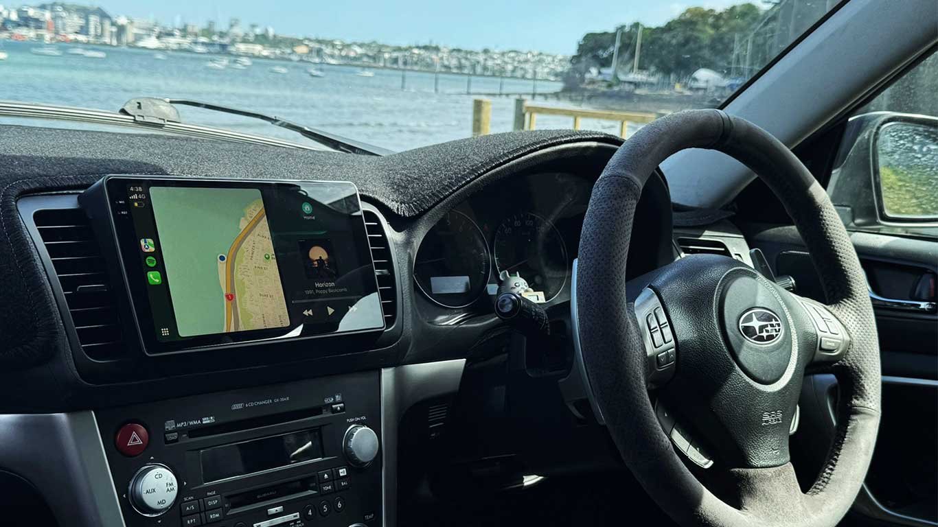 Head unit in vehicle at the wharf, evening scene